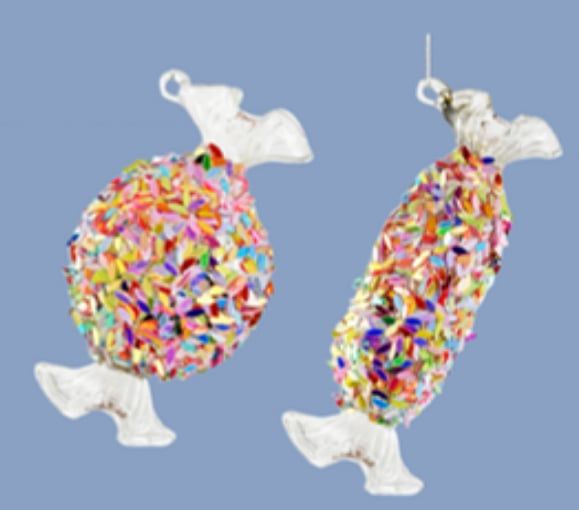 Două bomboane din sticlă cu ambalaj transparent, acoperite cu confetti multicolore